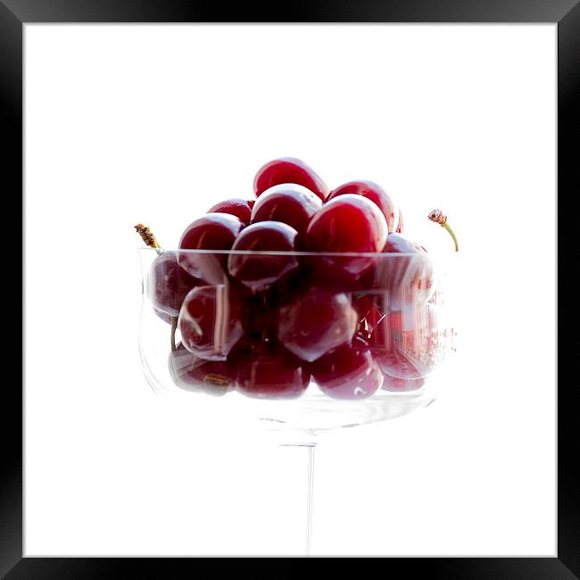 a glass of cherries Framed Print by Adrian Bud