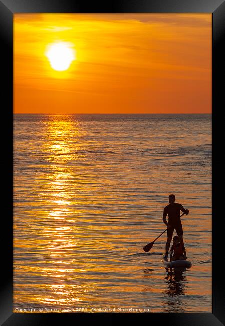 Paddle Board And Passenger At Sunset Framed Print by James Lavott