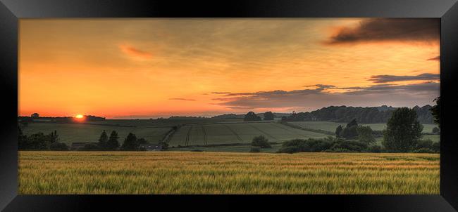 Sunset over the fields Framed Print by James Battersby