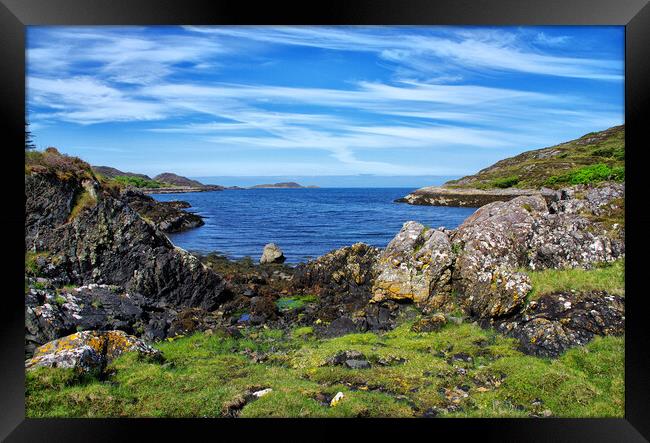 Rocky Cove by the sea  Framed Print by Jacqi Elmslie
