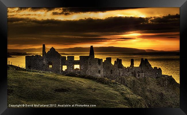 Sunset over majestic Dunluce Castle Framed Print by David McFarland