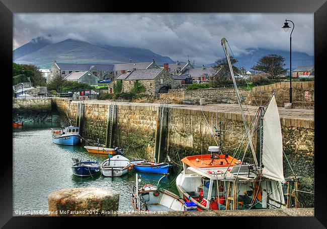 Shelter in Annalong harbour Framed Print by David McFarland