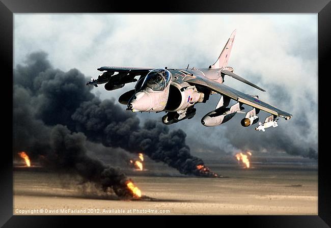 Low-level Harrier over burning oil wells Framed Print by David McFarland