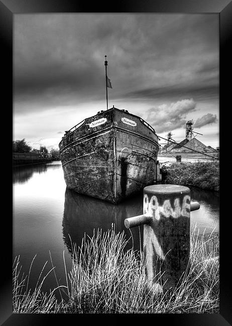 The sand barge tied up Framed Print by David McFarland