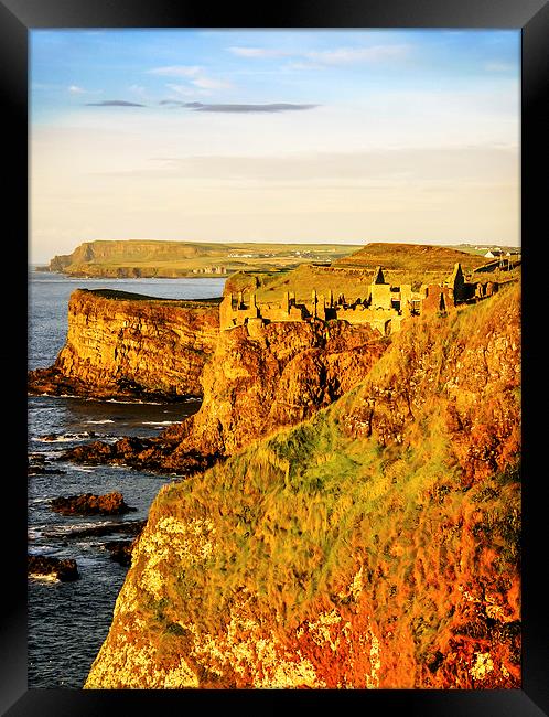 Dunluce Castle evening light Framed Print by David McFarland