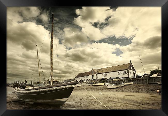Boat on mud at Burnham Framed Print by Stephen Mole
