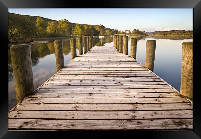 Jetty at Coniston Water with Yacht in Background Framed Print by Stephen Mole