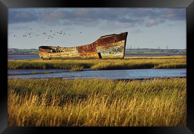 Rotting Hulk on the Medway Framed Print by James Rowland