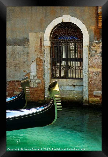 Gondola and arched doorway Framed Print by James Rowland