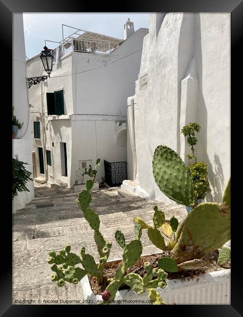 Whitewashed houses in Ostuni, Apulia, Italy Framed Print by Nicolas Duperrier