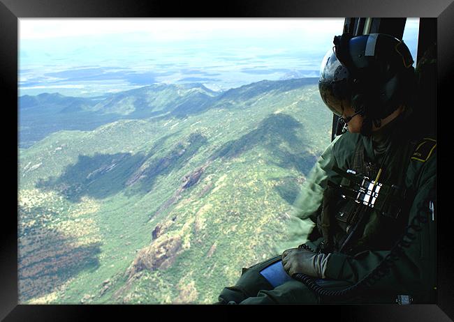 Loadmaster Duties Framed Print by John Russell