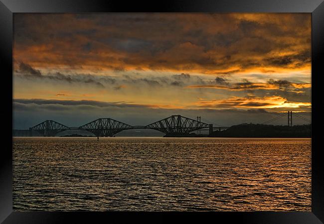 Sunset Over The Forth Bridges Framed Print by Andrew Beveridge