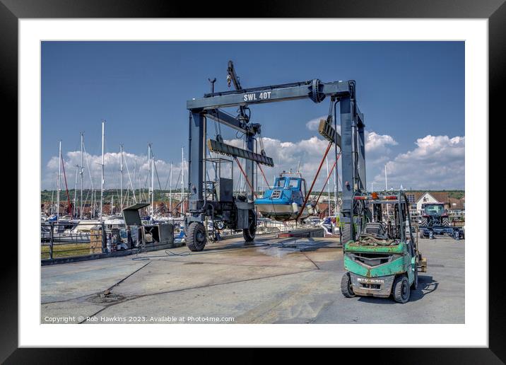 Marina boat lift  Framed Mounted Print by Rob Hawkins