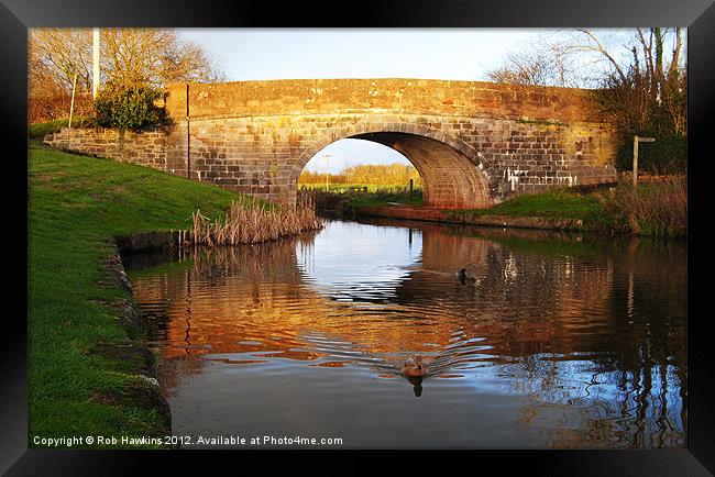Winter sun on the canal Framed Print by Rob Hawkins