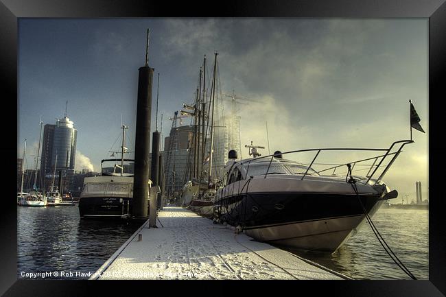 Yachts the city & snow Framed Print by Rob Hawkins
