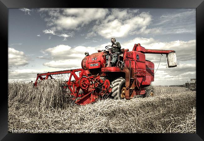 The old red Combine Framed Print by Rob Hawkins