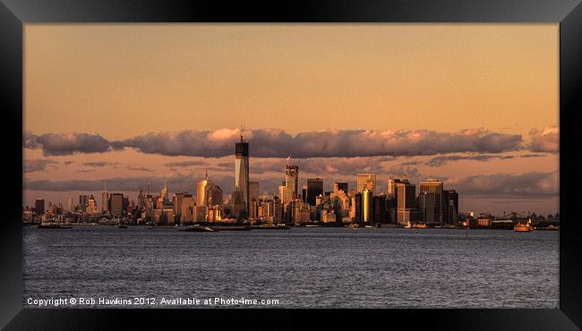Manhattan Skyline at dusk Framed Print by Rob Hawkins