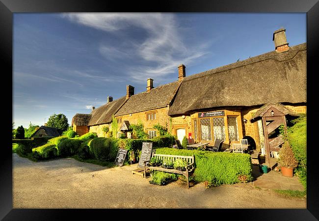 Thatched Cottages at Great Tew Framed Print by Rob Hawkins