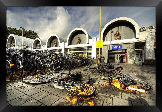 Bikes after the storm Framed Print by Rob Hawkins