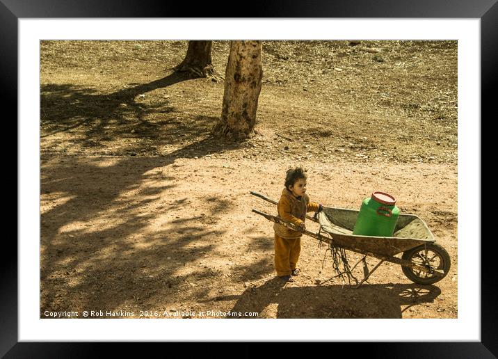 Wheelbarrow Girl  Framed Mounted Print by Rob Hawkins