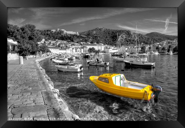 Yellow boat of Hvar in mono Framed Print by Rob Hawkins