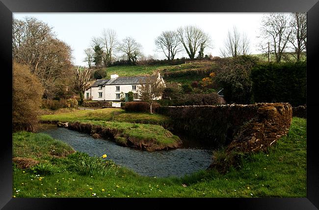 A cornish cottage by the stream Framed Print by Rob Hawkins