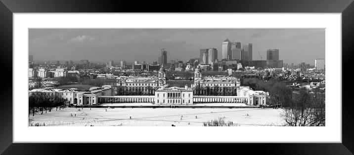 Snow bound panoramic view of the Isle of Dogs Gree Framed Mounted Print by Terry Senior