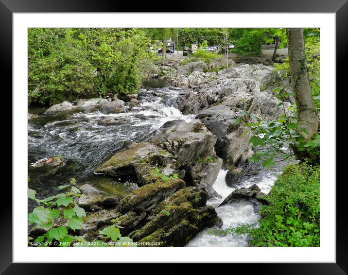 A waterfall in a forest at Betws-y-Coed Framed Mounted Print by Terry Senior