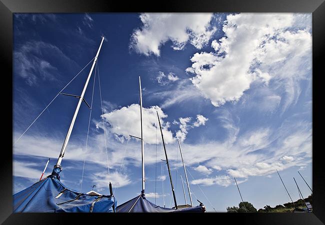 Masts and Clouds over Morston Quay Framed Print by Paul Macro