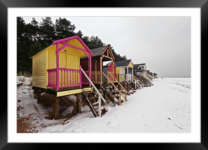 Snowy Wells Beach Huts Framed Mounted Print by Paul Macro