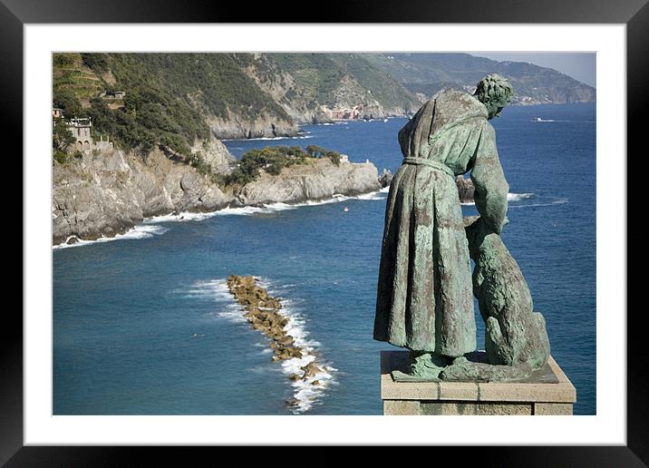 Statue of Saint Francis of Assisi petting a dog Framed Mounted Print by Ian Middleton