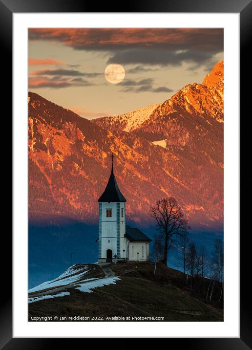 Full moon rising over Jamnik church and Storzic at sunset Framed Mounted Print by Ian Middleton