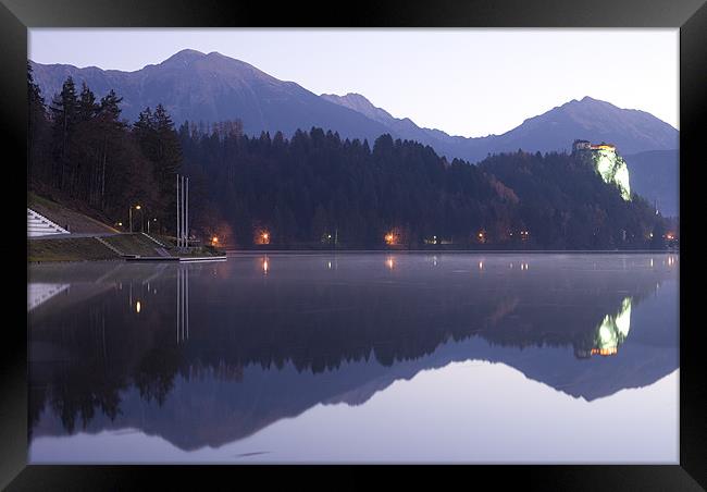 Dawn breaks over Lake Bled Framed Print by Ian Middleton