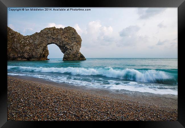 Durdle Door in the evening Framed Print by Ian Middleton