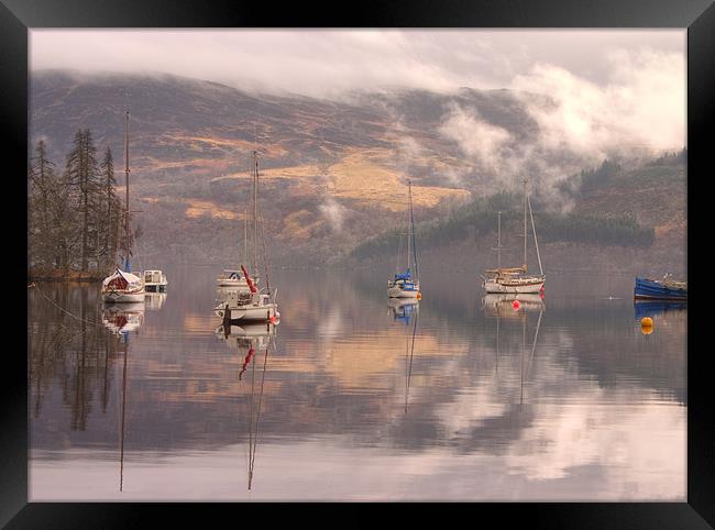 Morning reflections of Loch Ness Framed Print by Ian Middleton
