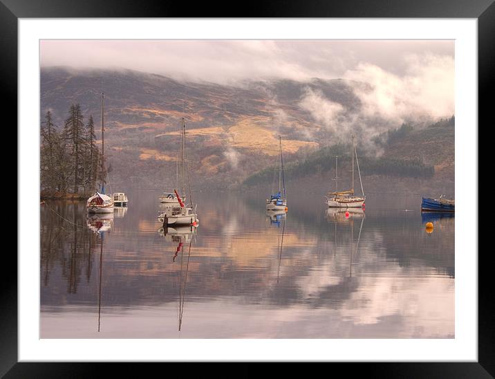 Morning reflections of Loch Ness Framed Mounted Print by Ian Middleton