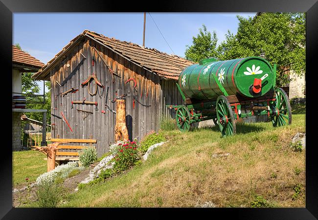 Old farm machinery in Nova Vas, Slovenia Framed Print by Ian Middleton
