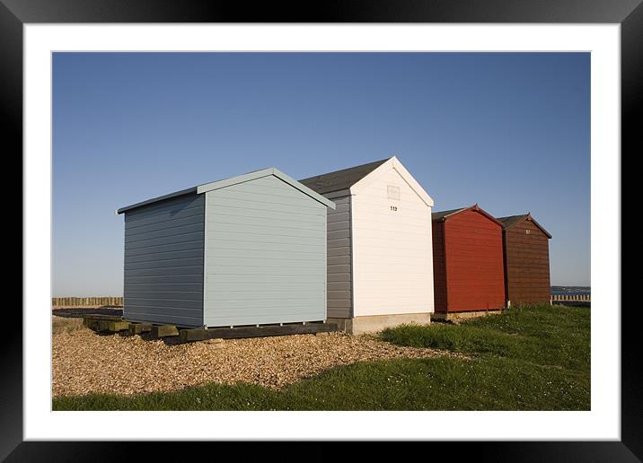Colourful beach huts in Calshot Framed Mounted Print by Ian Middleton