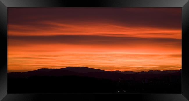 Sunset over Ljubljana suburb, Slovenia . Framed Print by Ian Middleton