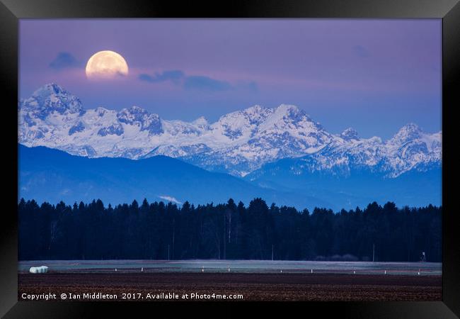 Full Moon setting over the Julian Alps Framed Print by Ian Middleton
