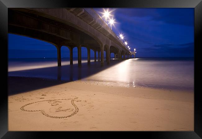 Love heart in the sand at Boscombe Pier Framed Print by Ian Middleton