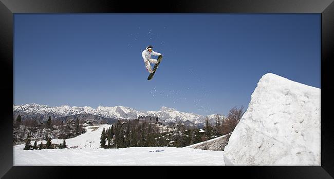 Snowboard jumper at Vogel Mountain, Slovenia Framed Print by Ian Middleton