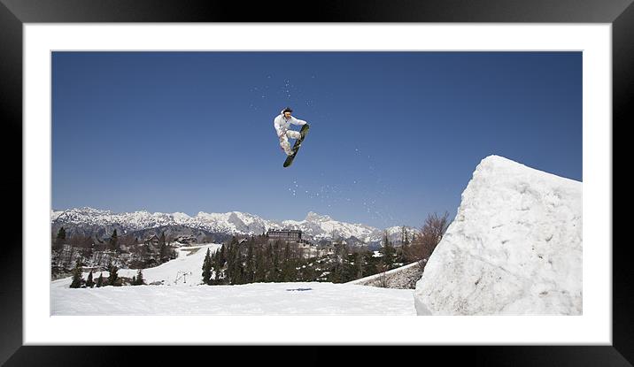 Snowboard jumper at Vogel Mountain, Slovenia Framed Mounted Print by Ian Middleton