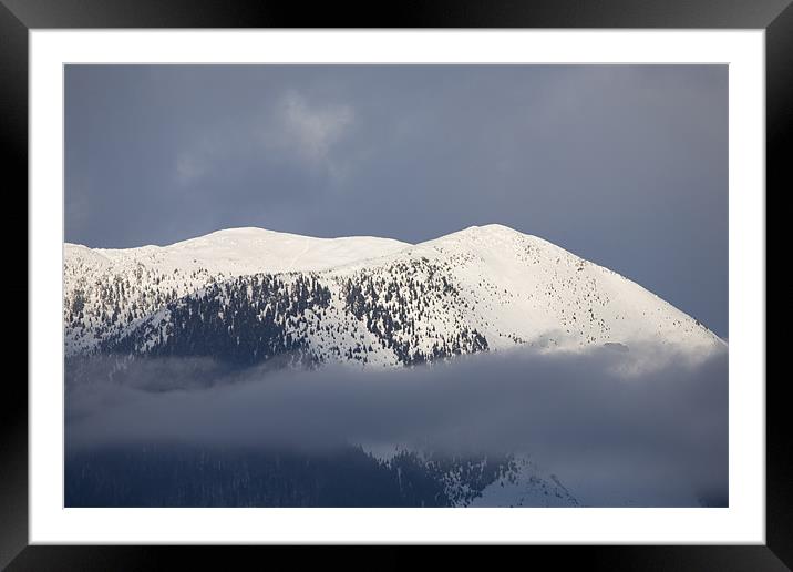 Snowy Alpine peak Framed Mounted Print by Ian Middleton