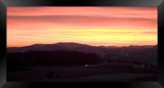 Sunset over Ljubljana Framed Print by Ian Middleton