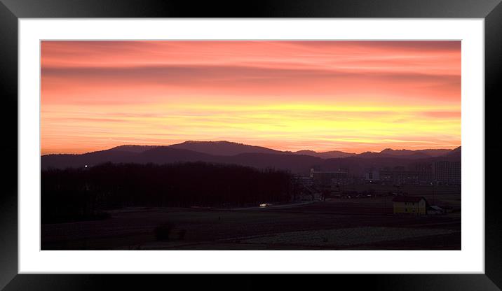 Sunset over Ljubljana Framed Mounted Print by Ian Middleton