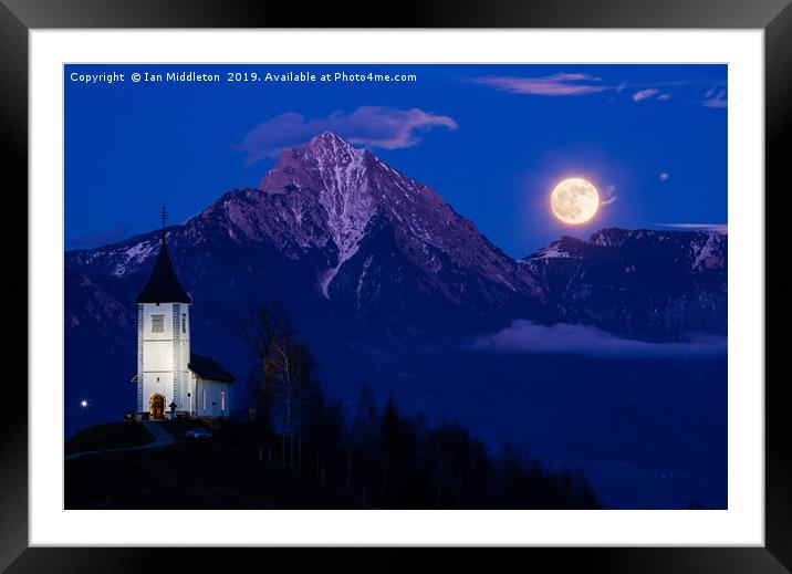 Full moon rising over Jamnik church and Storzic at Framed Mounted Print by Ian Middleton