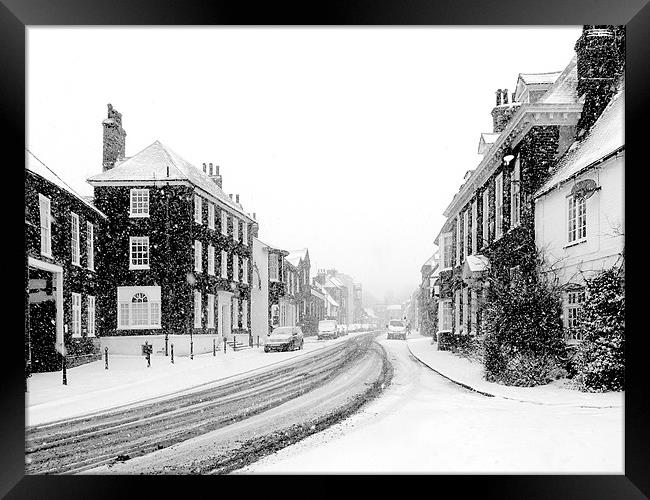 Snowy street scene Framed Print by Oxon Images