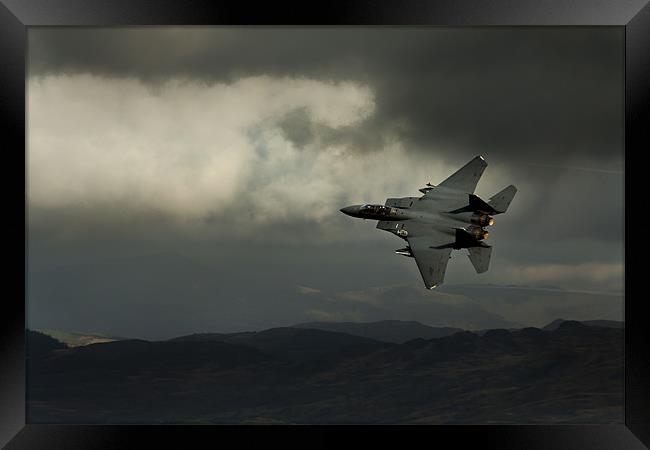 F15 in stormy sky Framed Print by Oxon Images