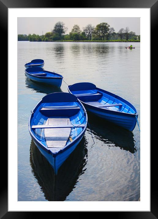 Blue boats on a lake Framed Mounted Print by Oxon Images